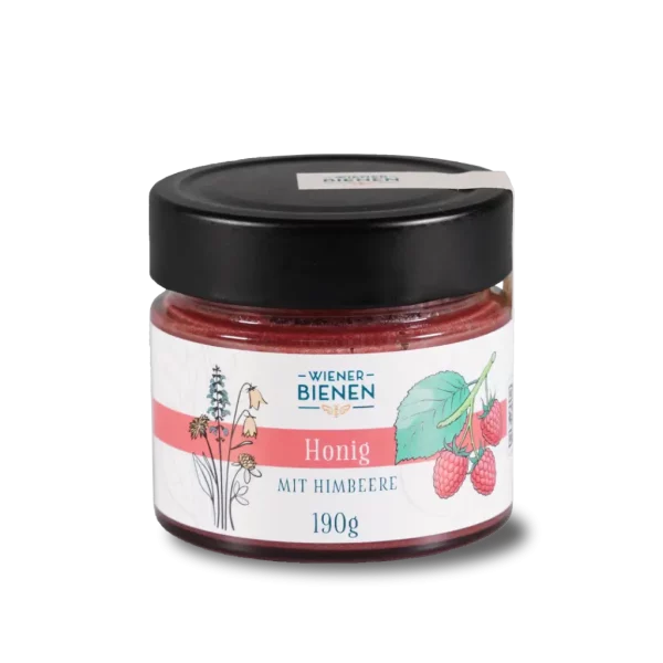 190g-Glas Wiener Bienen Cremehonig mit Himbeeren, kräftig rosa-rote Farbe und Etikett mit Himbeer-Illustration.
