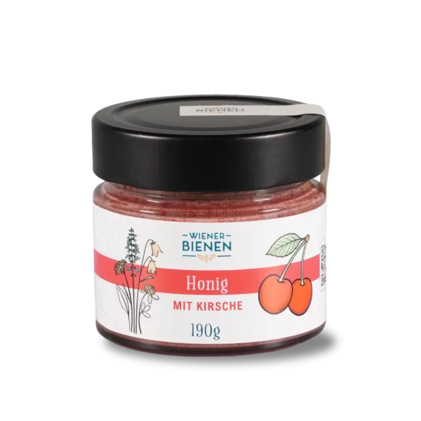 190g-Glas Wiener Bienen Cremehonig mit Kirsche, tiefrote Farbe und weißes Etikett mit Kirsch-Illustration