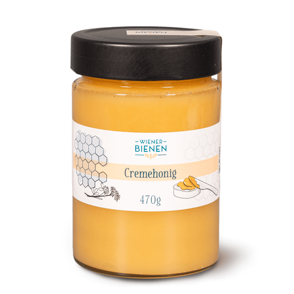 Regionaler Wiener Cremehonig von „Wiener Bienen“, abgefüllt in einem 470g-Glas mit minimalistischem Design und Blumen-Motiven.